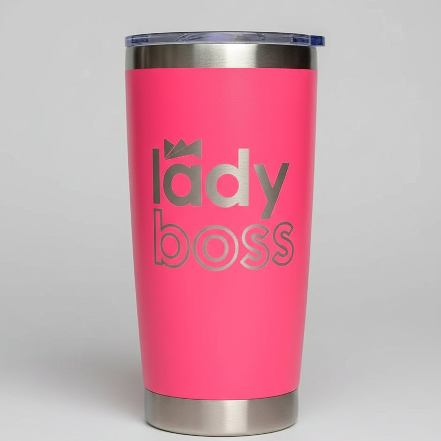 Pink tumbler with 'lady boss' text on a light gray background
