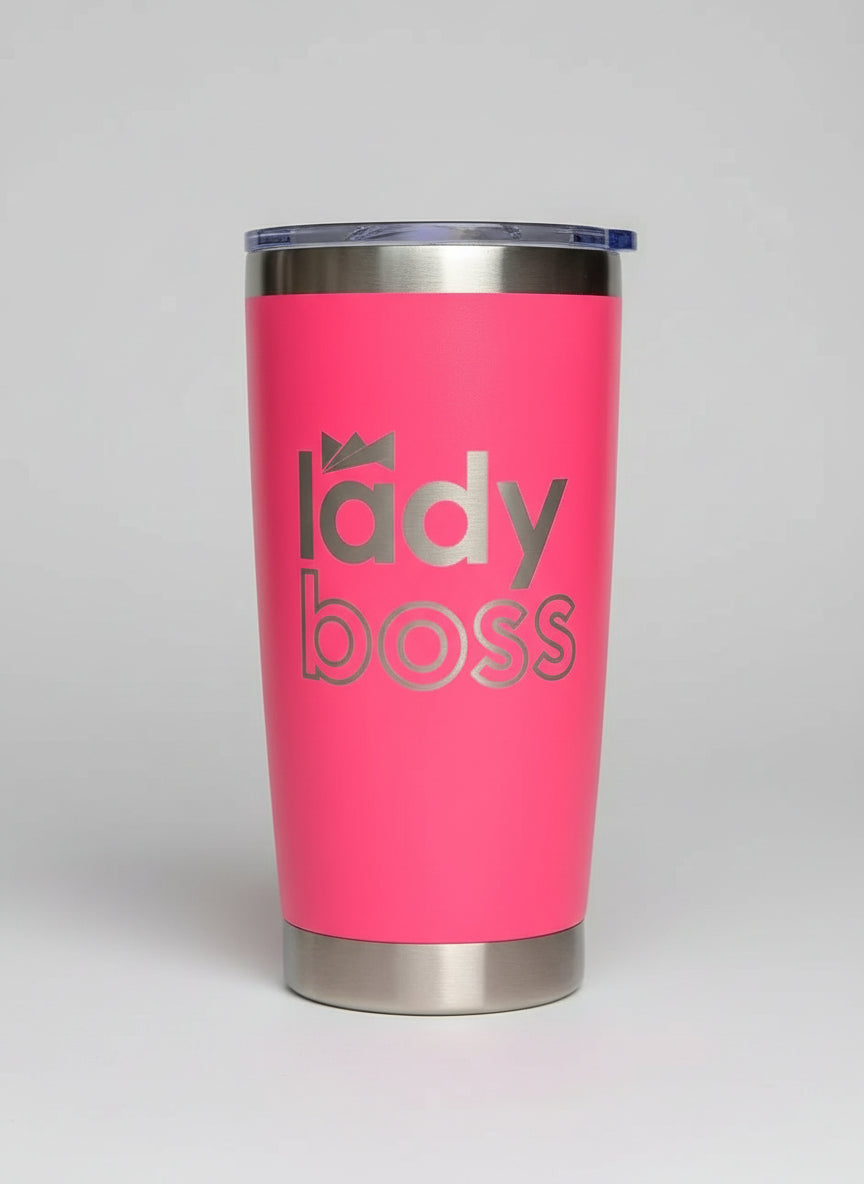 Pink tumbler with 'lady boss' text on a light gray background